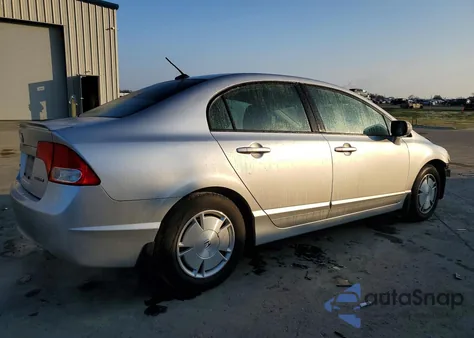 2010 Honda Civic Hybrid z USA, uszkodzony, nr VIN JHMFA3F23AS006199